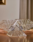 Mario Cioni Crystal Pyramidion Centerpiece Bowl by Tondo Doni on a dining table in dining interior available at Spacio India for luxury home decor accessories collection of Bowls.