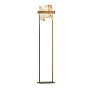 Modern floor lamp with gold base and marble-like shade on a white background by Masiero available at Spacio retail stores in Mumbai & Kolkata. 