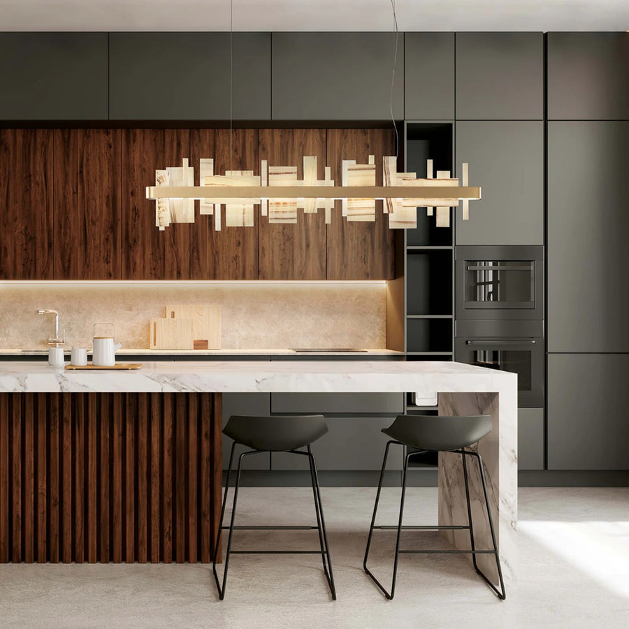 Modern kitchen with a island, stools, and a stylish light fixture by Masiero available at Spacio retail stores in Mumbai & Kolkata. 