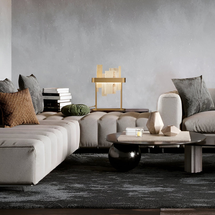Modern living room with gray sofa, coffee table, and decorative pillows by Masiero available at Spacio retail stores in Mumbai & Kolkata. 