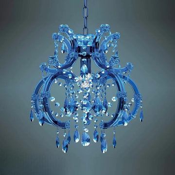 Blue chandelier with crystal elements on a dark background