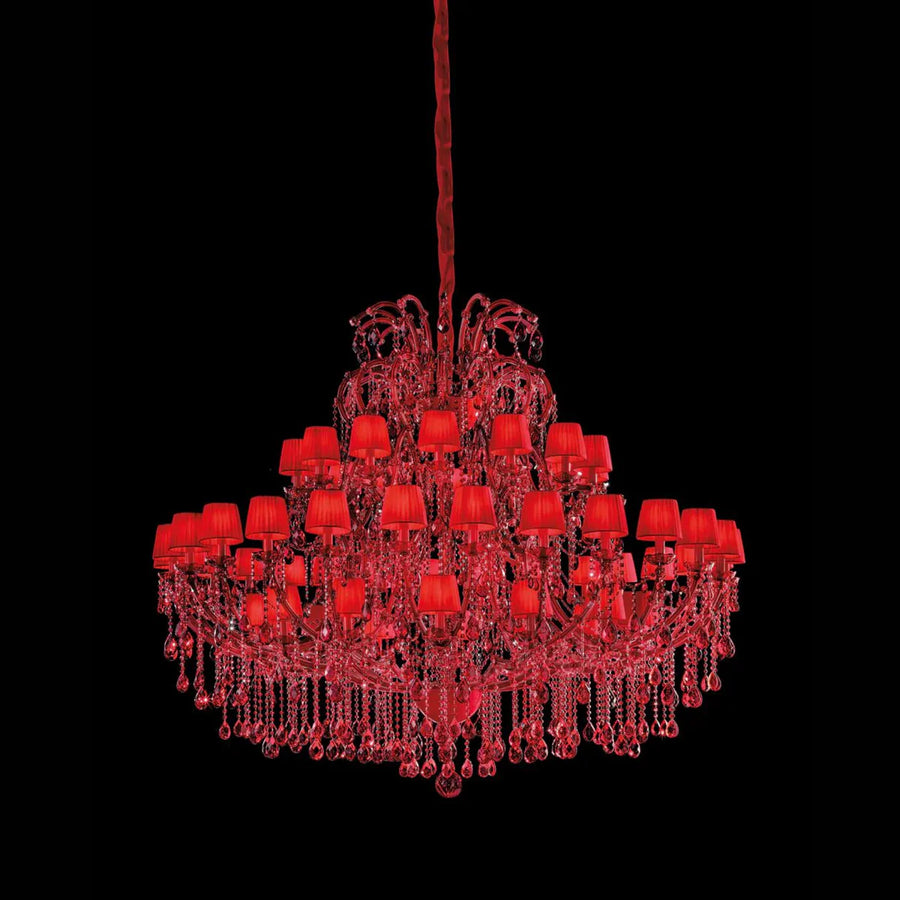 Red chandelier against a black background from Masiero available at Spacio in India