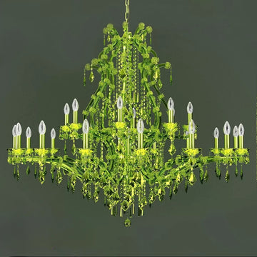 Classic Green crystal chandelier by Masiero on a dark background available at Spacio in India. 