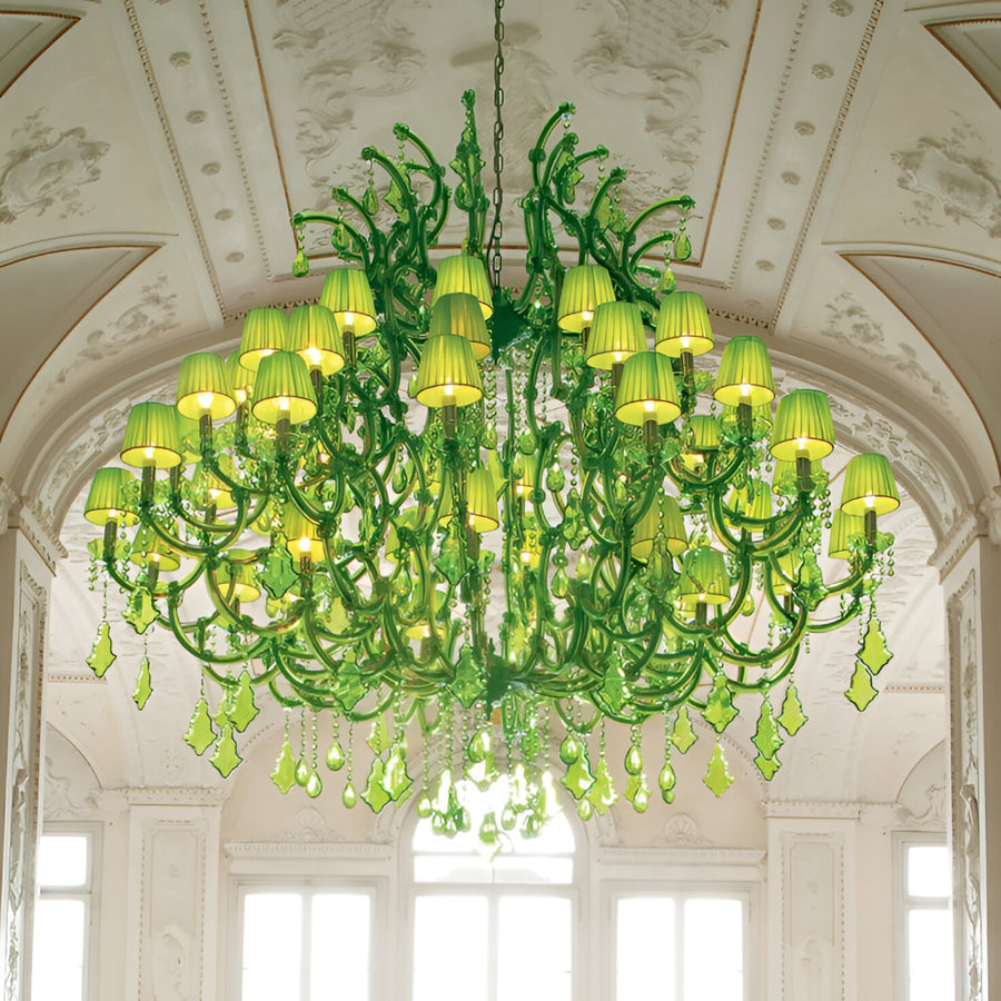 Classic Green crystal chandelier hanging in a room with white walls and windows by Masiero