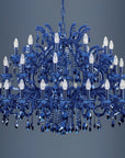 Classic Blue crystal chandelier with clear crystals on a gray background by Masiero at Spacio in India. 
