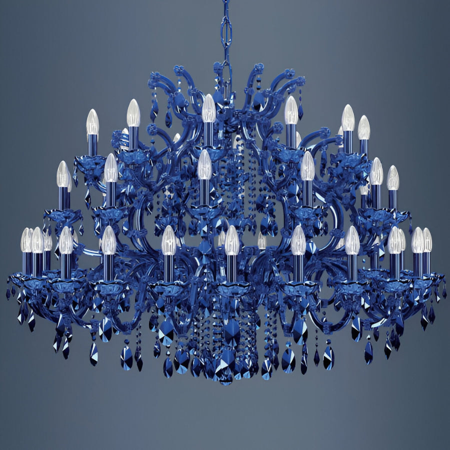 Classic Blue crystal chandelier with clear crystals on a gray background by Masiero at Spacio in India. 