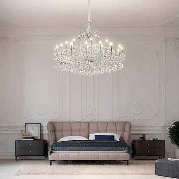 Luxurious bedroom with a large crystal chandelier by Masiero from Spacio