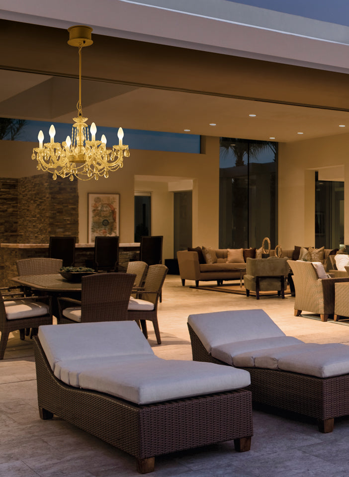 Luxury lounge area with chandelier, couches, and chairs in a high-end interior setting.