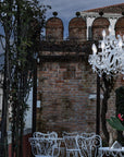 Chandelier in an outdoor setting with a scenic background from Masiero's Drylight collection. 