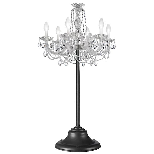 Outdoor crystal chandelier from Masiero's Drylight collection on a black stand against a white background