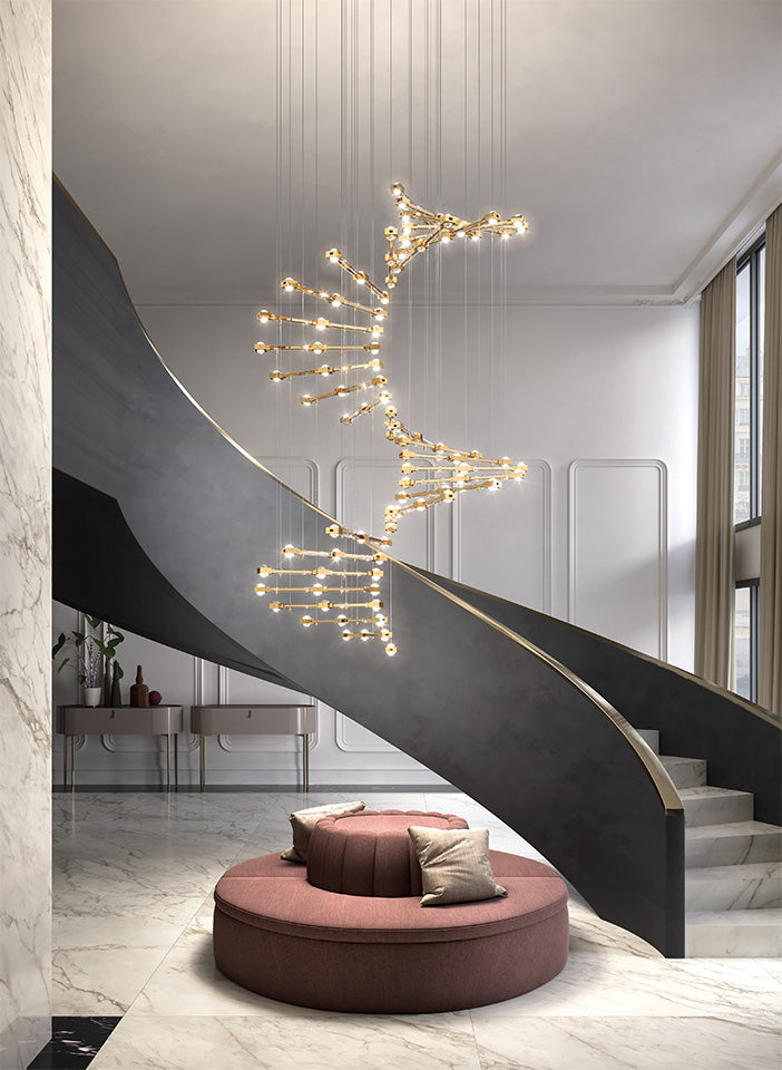 Modern staircase with a decorative chandelier in a stylish interior setting.