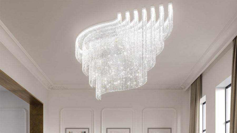 Modern chandelier hanging from a ceiling in a well-lit room.