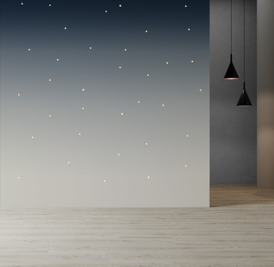 Meystyle Stars Boutique LED Wallpaper in a soft gradient blue from dark to light, featuring warm LED stars. Luxury UK wall covering at Spacio India.