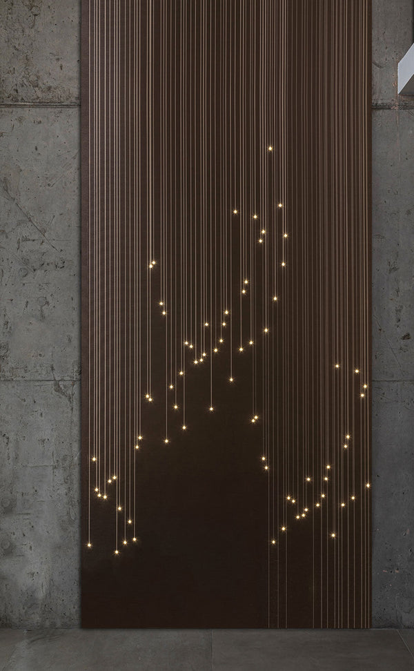 Meystyle Illusion of Entropy Infinity LED Crystal wall covering on a grey rustic wall. Availabel at Spacio in India