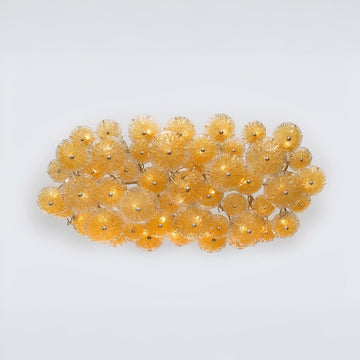 Decorative yellow flower ceiling light on a light gray background