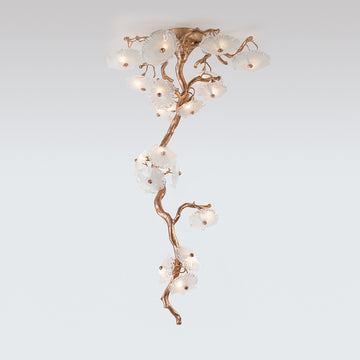 Decorative ceiling light fixture with floral design on a white background