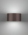 Cylindrical brown rechargeable light fixture on a gray background