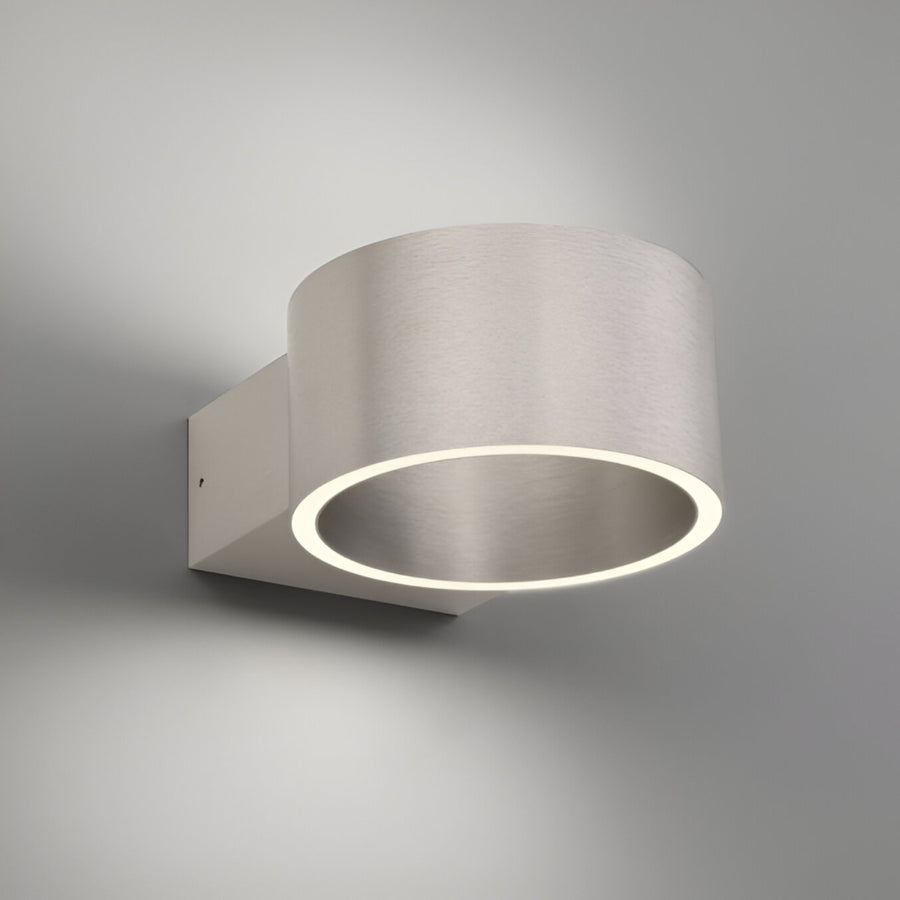 Modern wall-mounted light fixture on a gray background