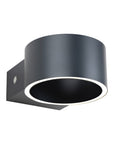 Black cylindrical rechargeable wall light fixture on a white background