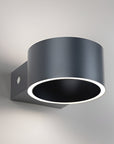 Black wall-mounted rechargeable light fixture on a gray background