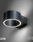 Black wall-mounted light fixture with 'Neubau Pure' branding on a gray background
