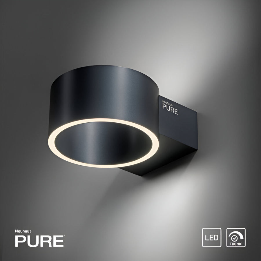 Black wall-mounted light fixture with 'Neubau Pure' branding on a gray background