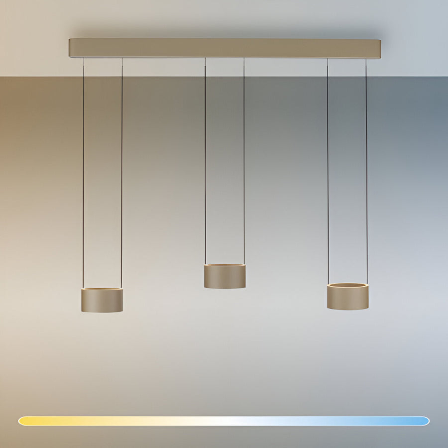 Modern pendant light fixture with three hanging lights against a gradient background