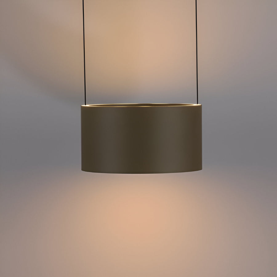 Modern pendant light with a cylindrical shade on a neutral background