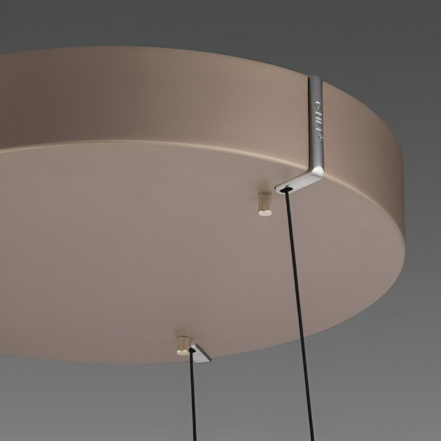 Ceiling kinetic light fixture with a neutral background