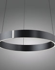 Modern pendant light with a black circular design on a gray background