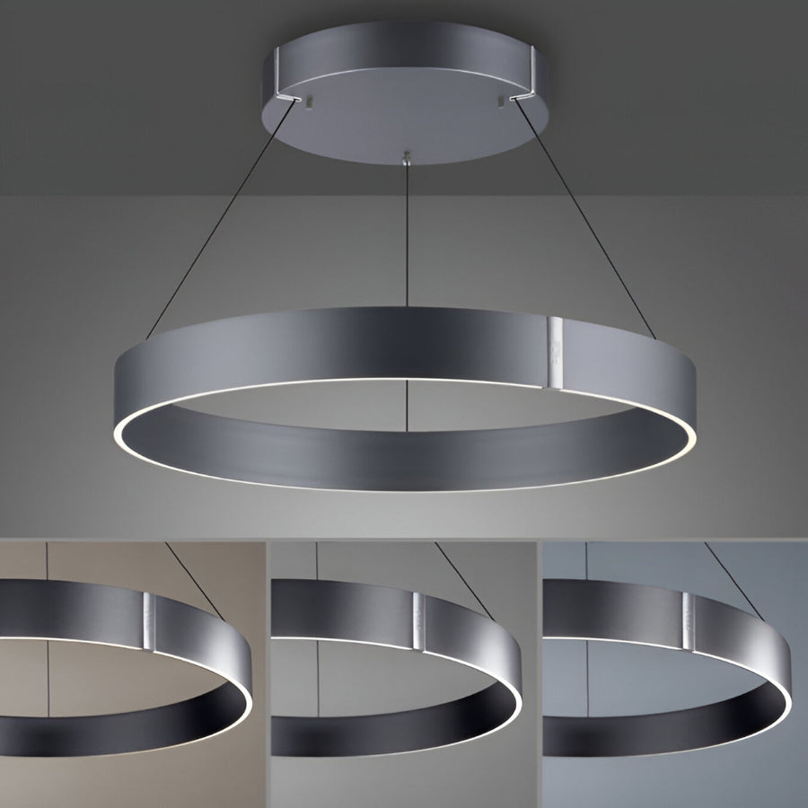 Modern pendant kinetic light with circular design on a gray background showing different colour temperatures. 