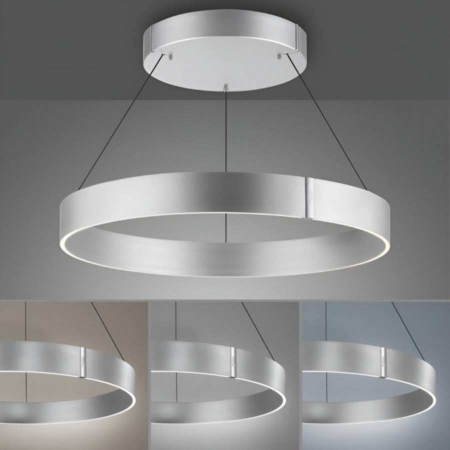 Modern kinetic chandelier with circular design on a gray background