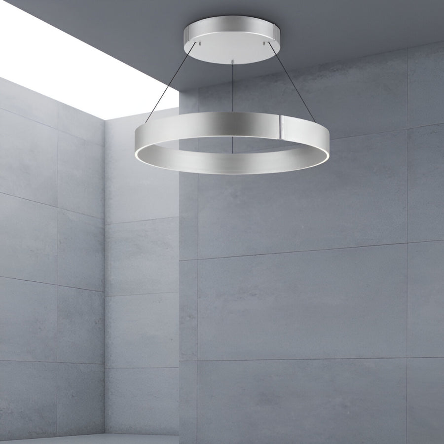 Modern kinetic pendant chandelier in a gray room