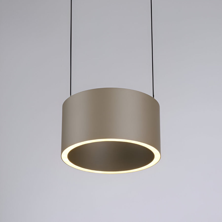 Modern pendant light with a cylindrical shade on a gray background