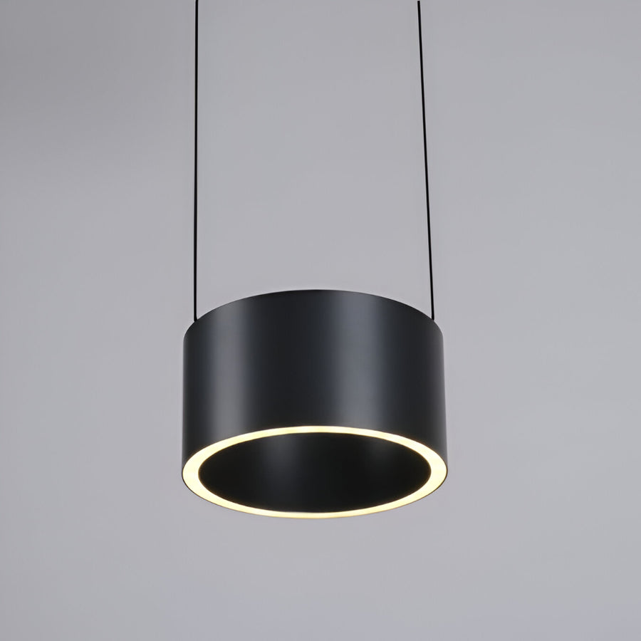 Black pendant light with a gray background
