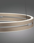 Modern pendant kinetic light with circular design on a gray background