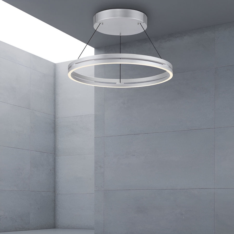 Modern ceiling kinetic light fixture in a gray room