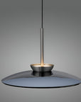 Modern pendant kinetic light with a dark glass shade on a gray background