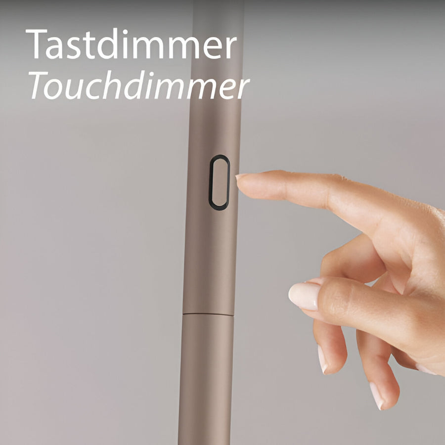 Hand pressing a touch dimmer switch on a light fixture with text 'Tastdimmer Touchdimmer'.