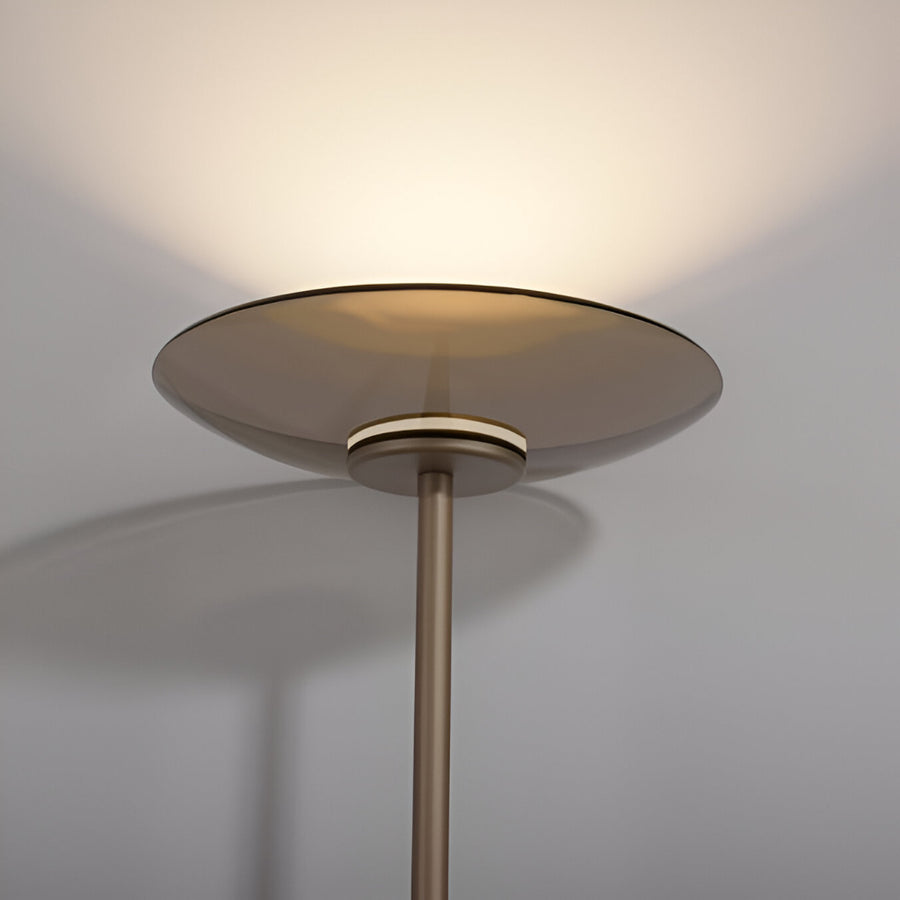 Ceiling light fixture with a metallic finish on a neutral background