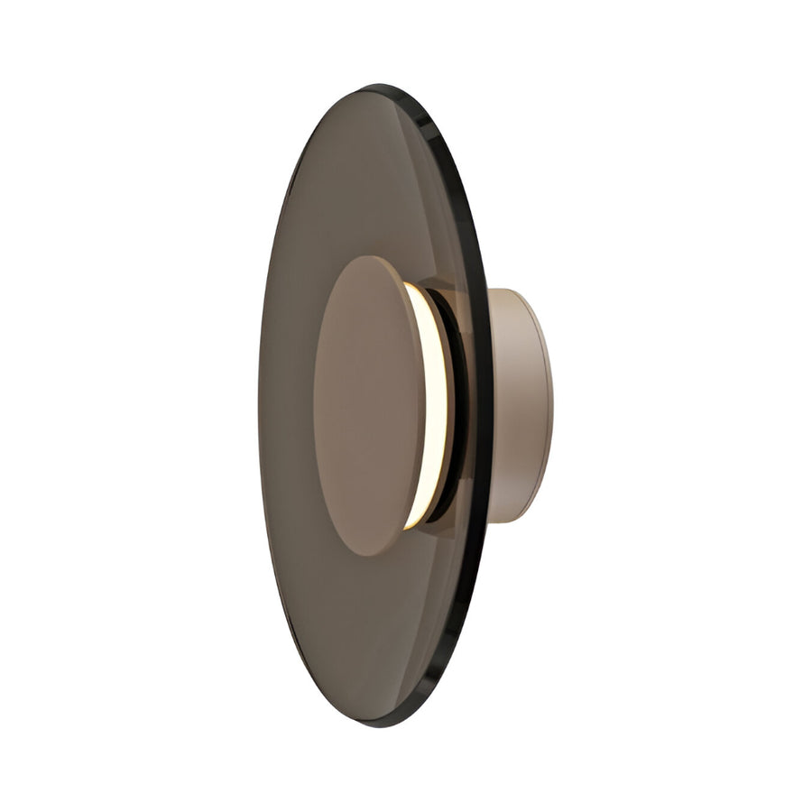 Modern wall light fixture with a round design on a white background