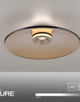 Ceiling light fixture with 'PURE' branding on a neutral background