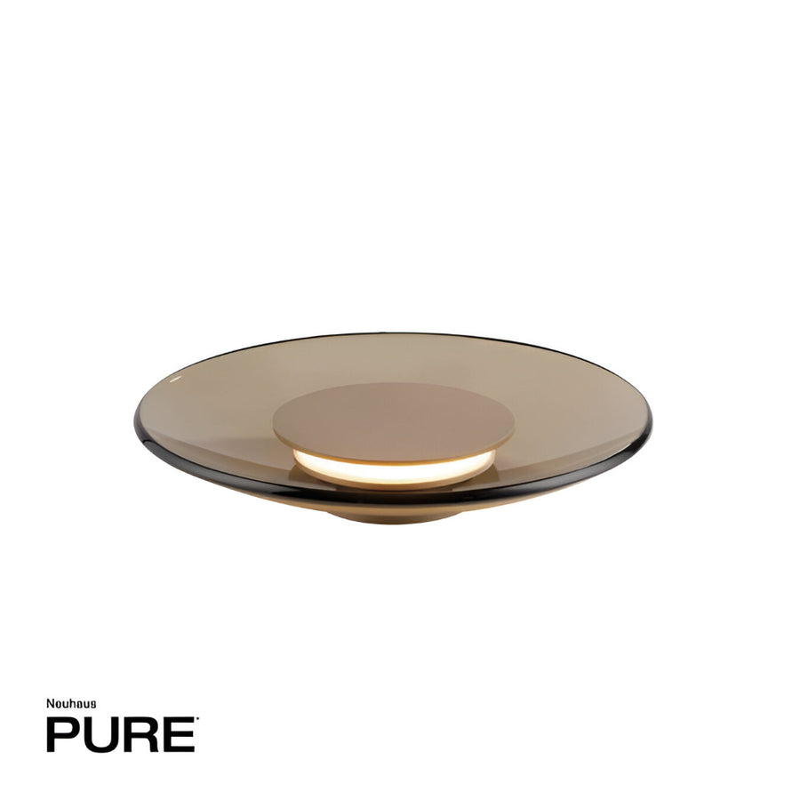 Round glass table lamp with a reflective surface on a white background, featuring the brand 'Neuhaus'.