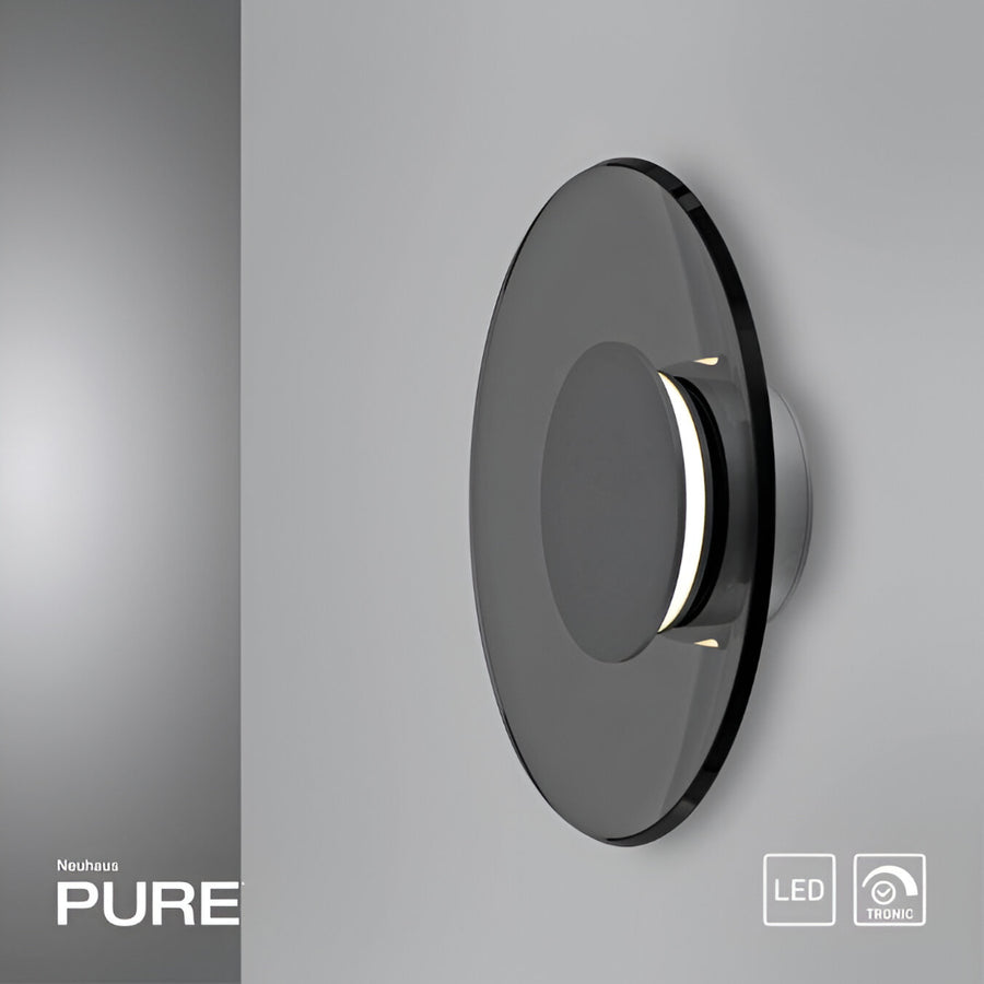 Modern wall light fixture with 'PURE' branding on a gray background