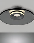 Modern ceiling light fixture on a gray background