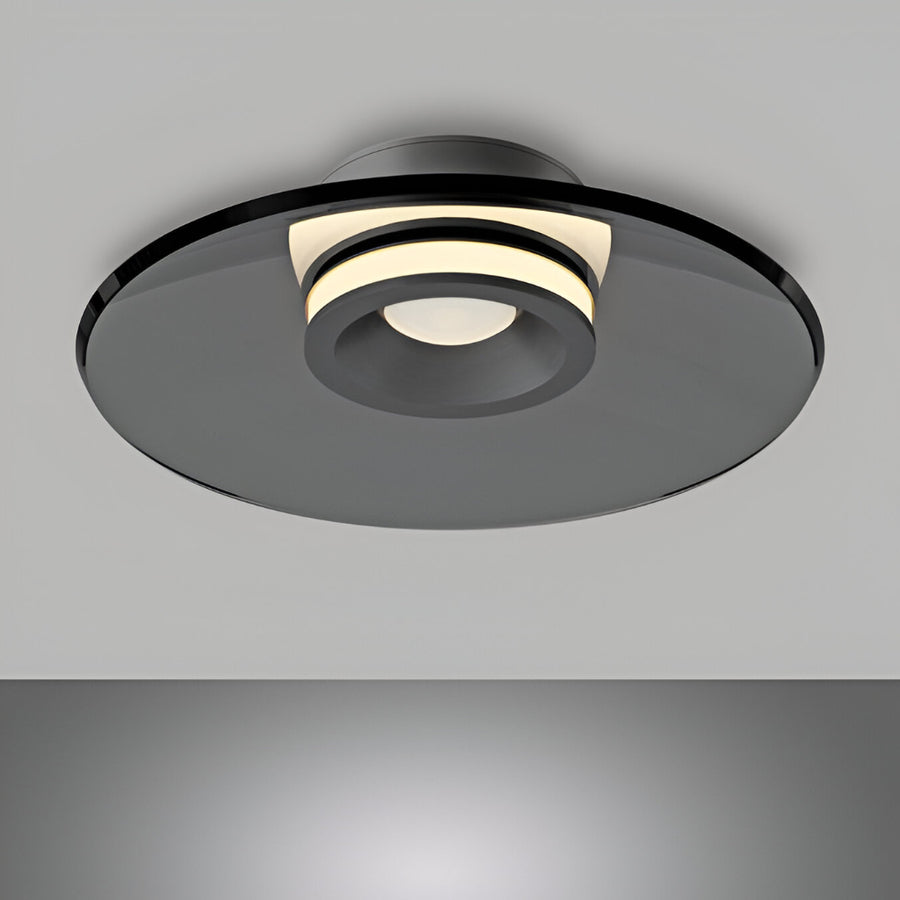 Modern ceiling light fixture on a gray background