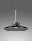 Modern pendant light with a dark gray shade on a gray background