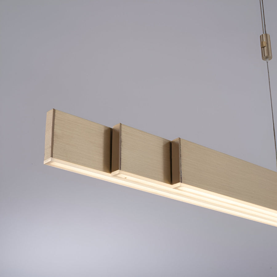 Modern pendant kinetic light fixture on a gray background