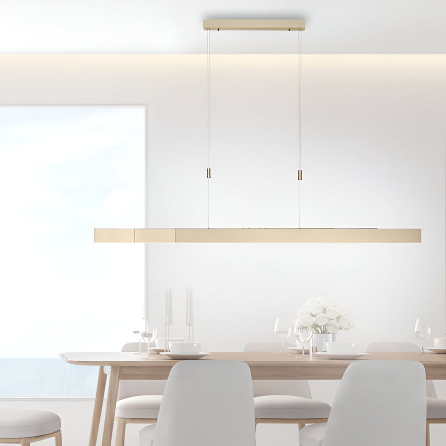 Modern dining room with a long rectangular pendant kinetic light fixture.