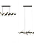 Two modern pendant kinetic lights with a black frame and multiple hanging bulbs on a white background.
